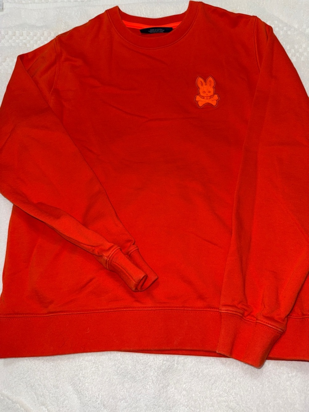 Psycho Bunny kids Crewneck Sweatshirt in Vibrant Orange with Embroidered Bunny